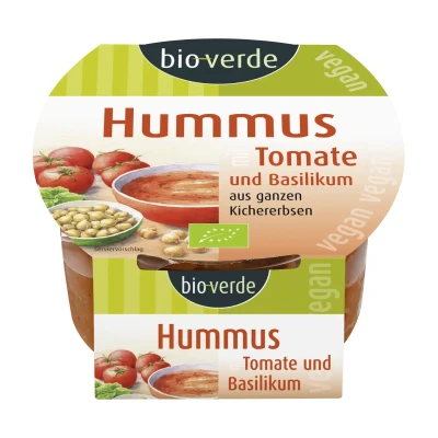 Humusas su saulėje džiovintais pomidorais ir bazilikais, ekologiškas